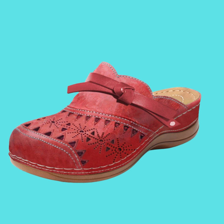 Aerina - Mules planas acolchadas