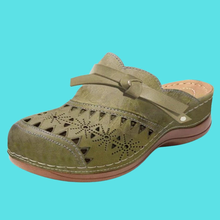 Aerina - Mules planas acolchadas