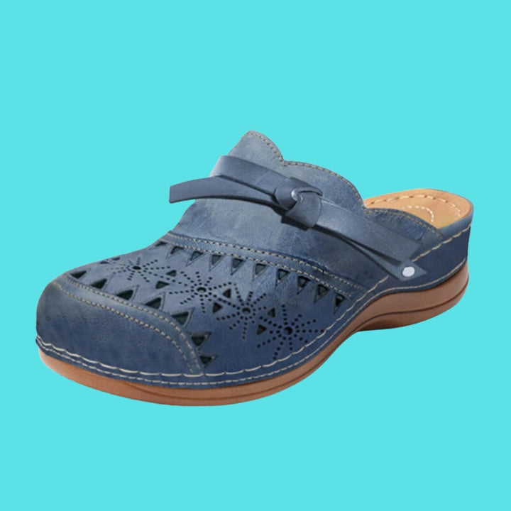 Aerina - Mules planas acolchadas