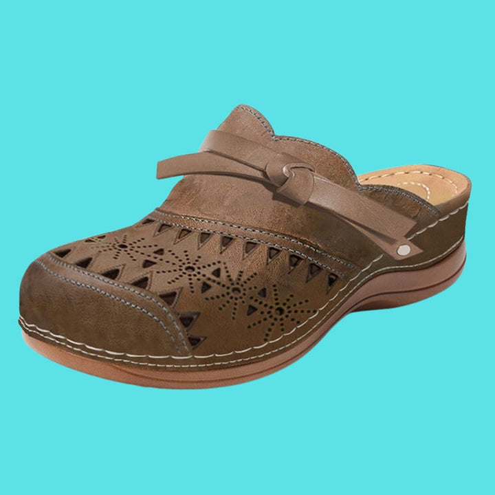 Aerina - Mules planas acolchadas