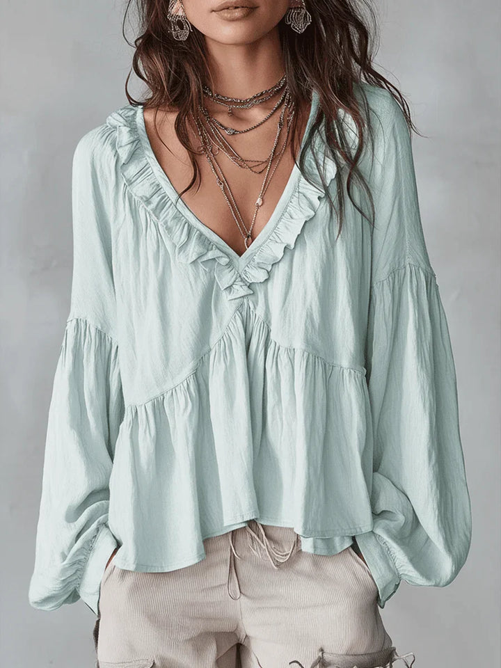 Narella - Blusa con holanes y escote en V