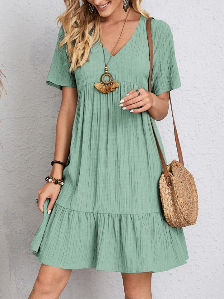 Belinda - Minivestido texturizado con escote en V y holanes