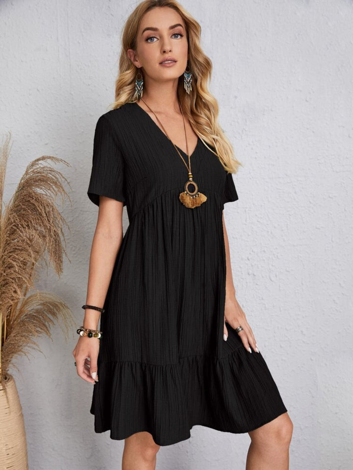 Belinda - Minivestido texturizado con escote en V y holanes