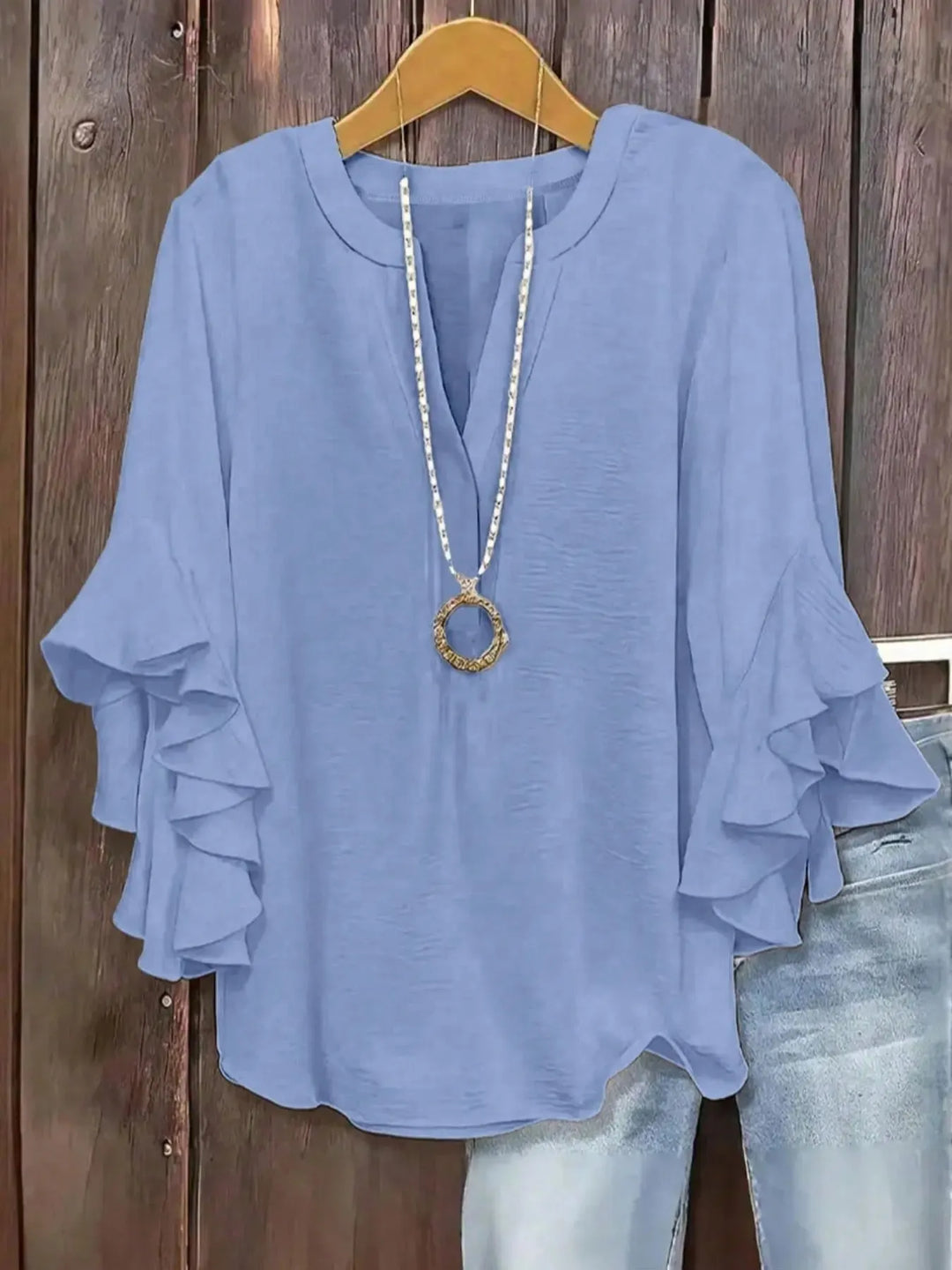 Norabelle - Blusa elegante con holanes en las mangas