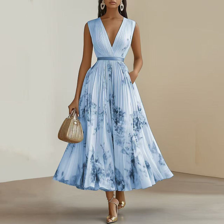 Nadia - Vestido midi plisado floral
