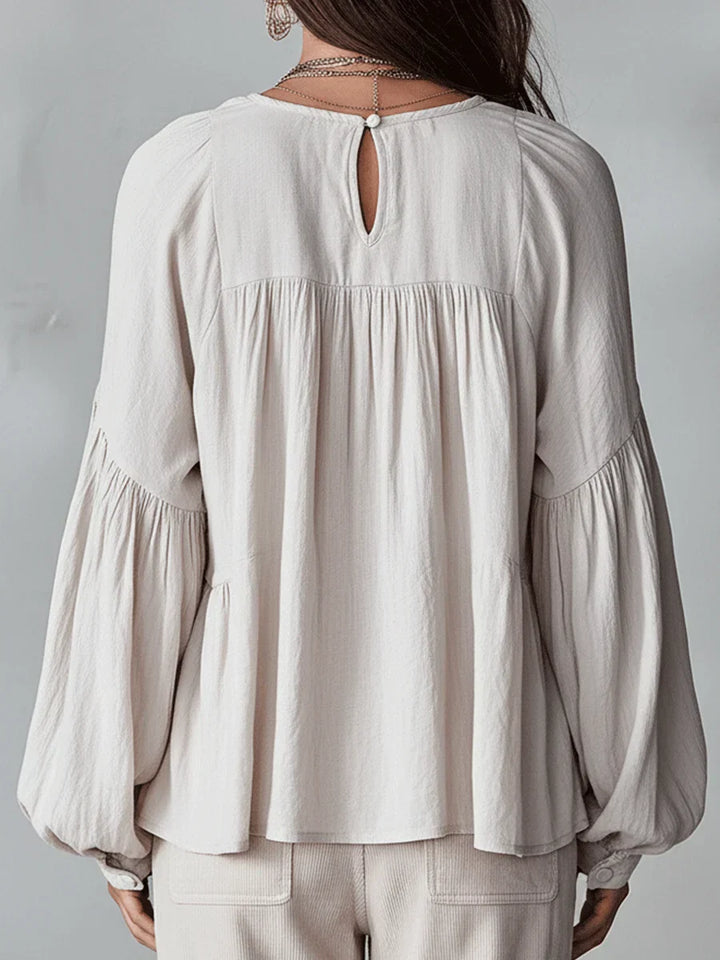 Narella - Blusa con holanes y escote en V