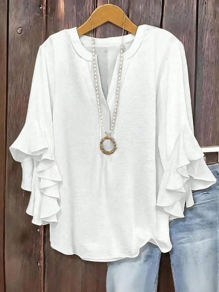 Norabelle - Blusa elegante con holanes en las mangas