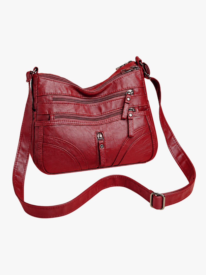 Esme - Bolsa bandolera con múltiples compartimentos