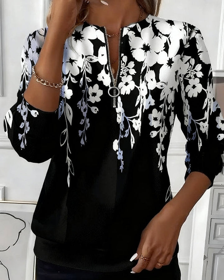Brisella - Blusa floral con cierre