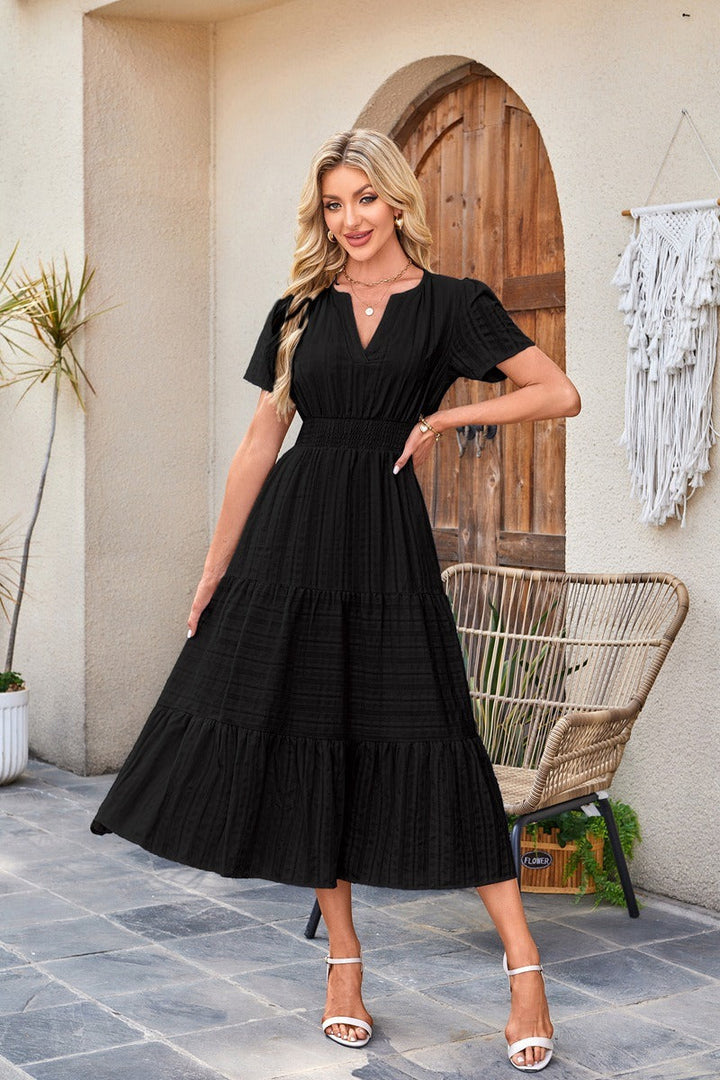 Astrelle - Vestido largo texturizado con capas