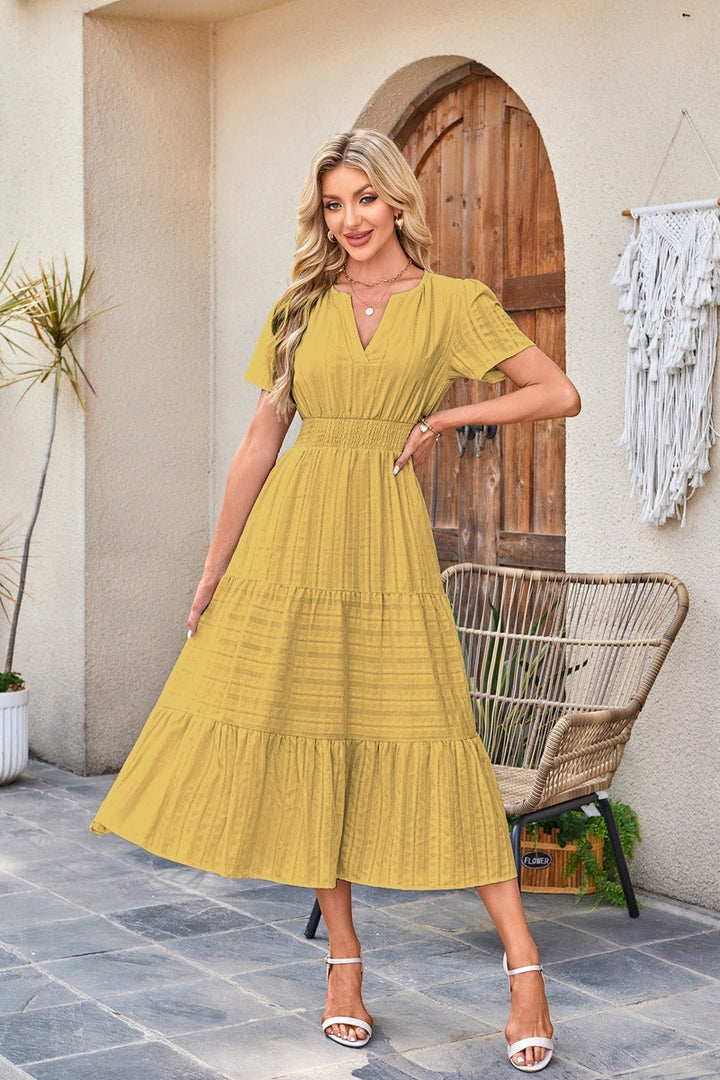 Astrelle - Vestido largo texturizado con capas