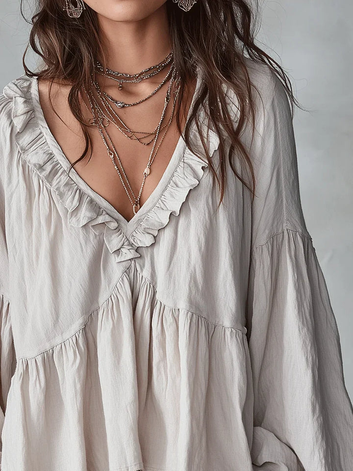 Narella - Blusa con holanes y escote en V