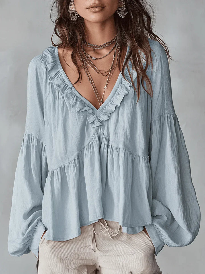 Narella - Blusa con holanes y escote en V