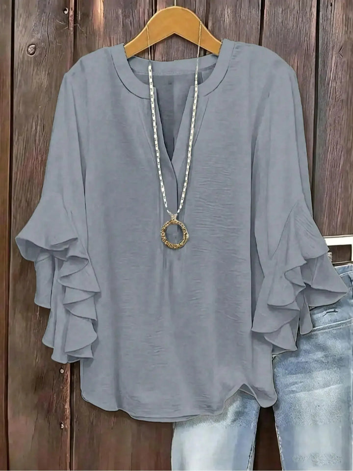 Norabelle - Blusa elegante con holanes en las mangas