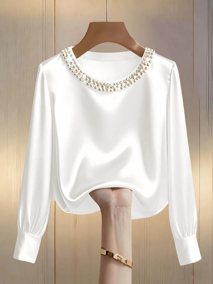 Avara - Blusa elegante con perlas