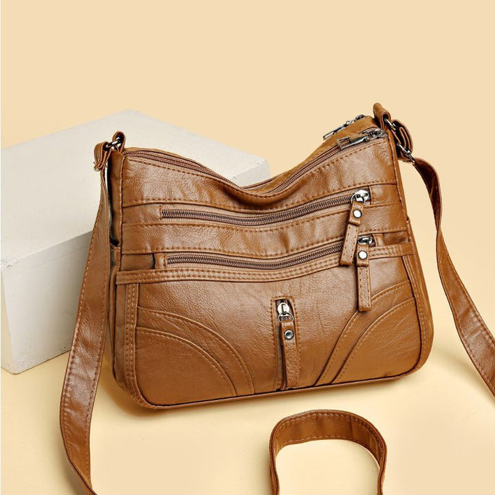 Esme - Bolsa bandolera con múltiples compartimentos
