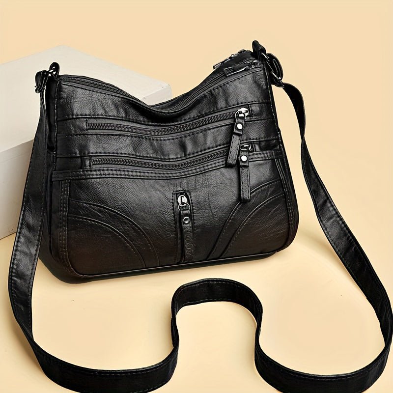 Esme - Bolsa bandolera con múltiples compartimentos