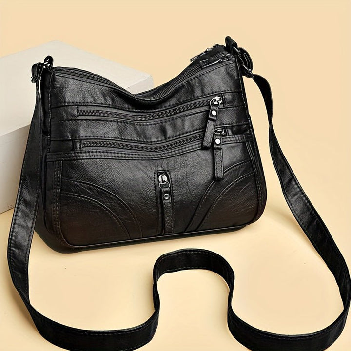 Esme - Bolsa bandolera con múltiples compartimentos