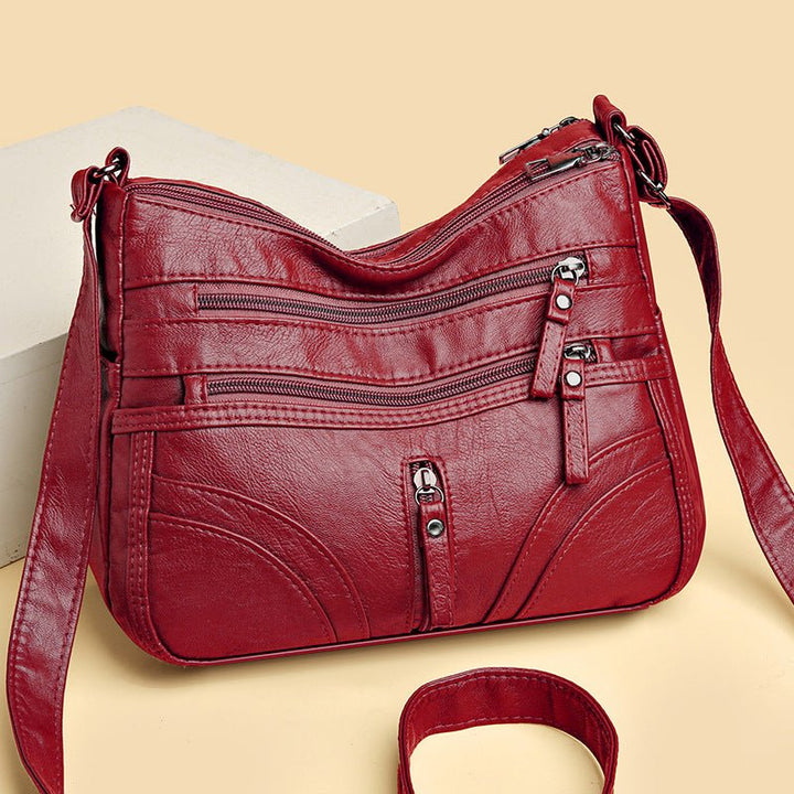 Esme - Bolsa bandolera con múltiples compartimentos