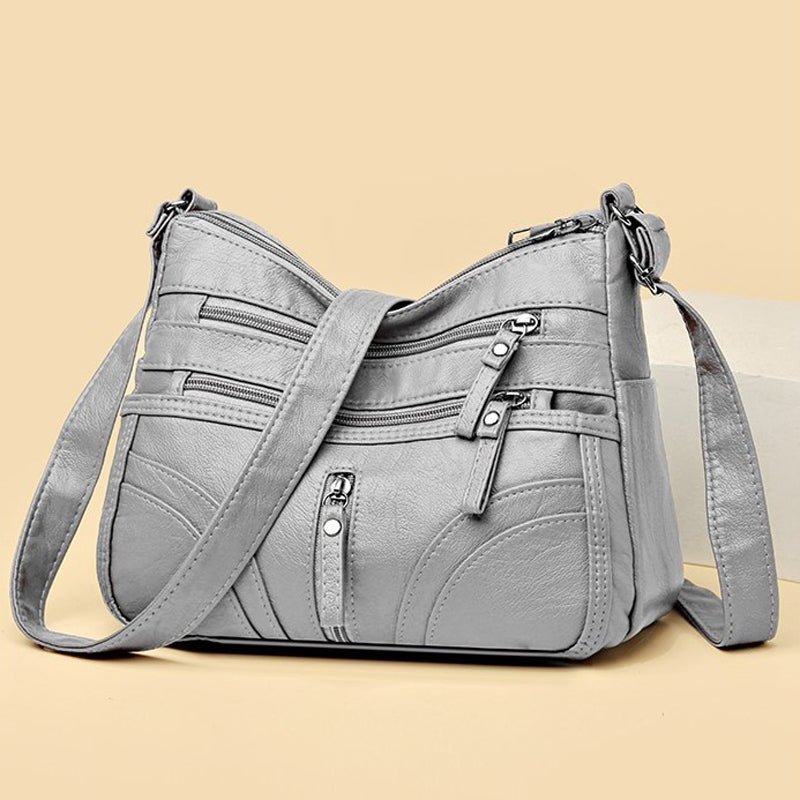 Esme - Bolsa bandolera con múltiples compartimentos