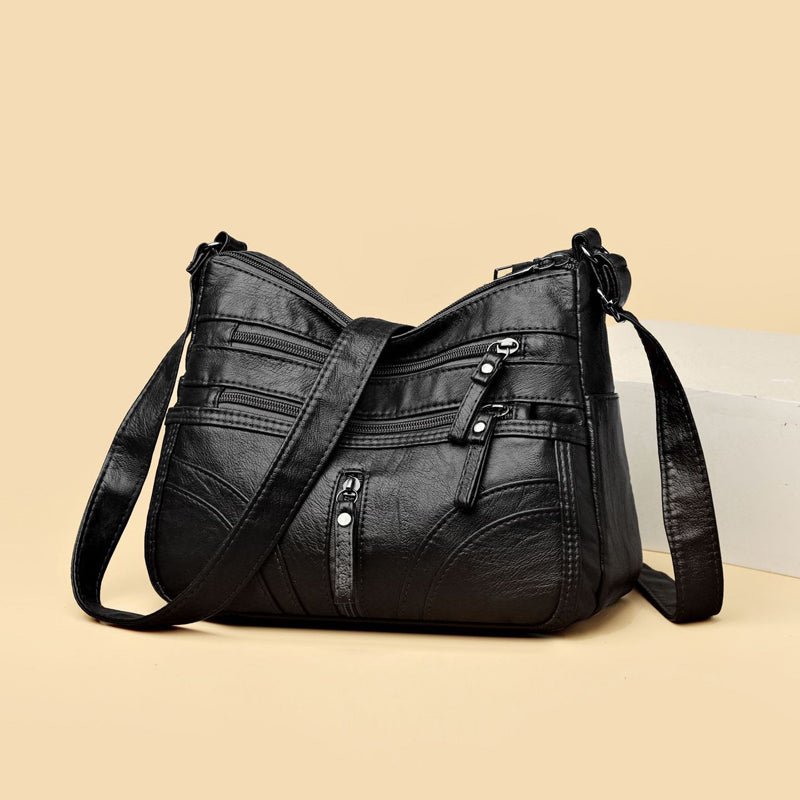 Esme - Bolsa bandolera con múltiples compartimentos