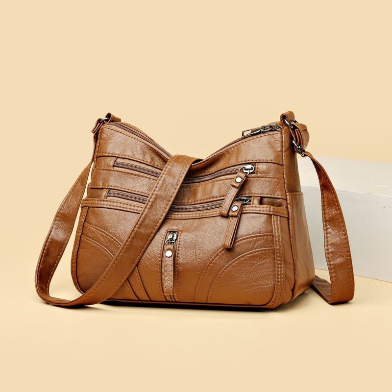 Esme - Bolsa bandolera con múltiples compartimentos