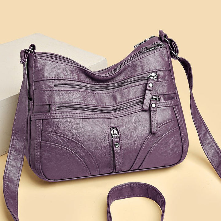 Esme - Bolsa bandolera con múltiples compartimentos