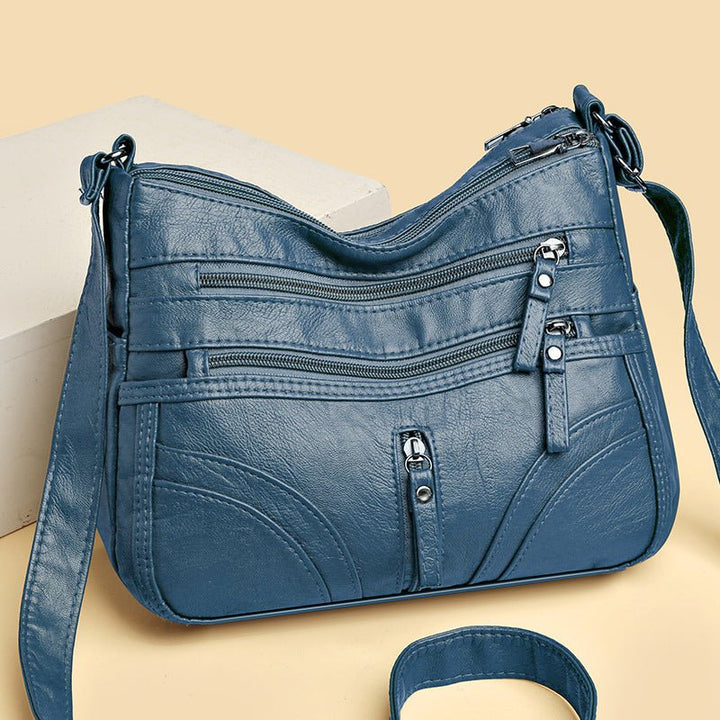 Esme - Bolsa bandolera con múltiples compartimentos