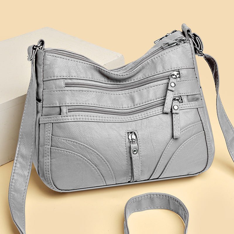 Esme - Bolsa bandolera con múltiples compartimentos