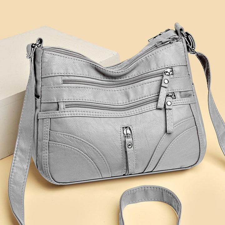 Esme - Bolsa bandolera con múltiples compartimentos